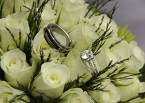 wedding rings on wedding flowers